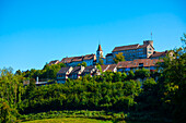 Medieval Old Cityscape with House and Castle Tower on a Hill in a Sunny Summer Day with Blue Sky in Regensberg, Zurich Canton, Switzerland.