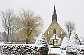 church of the village of Saint-Lucien covered with snow, department of Eure-et-Loir, Centre-Val-de-Loire region, France, Europe
