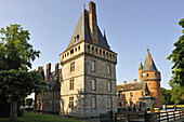 Medieval square tower from 13th et Renaissance tower in background,Chateau de Maintenon,Eure et Loir department, region Centre,France, Europe