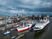  Aerial view of the cruise ship Vasco da Gama (nicko cruises) docking at the Überseebrücke on the Elbe during the Hamburg Cruise Days 2025, with the Elbphilharmonie and the city center behind it, Hamburg, Germany, Europe 