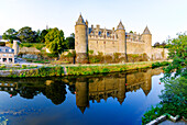  Château de Rohan with reflection in the Oust River in Josselin, Morbihan, Brittany, France 