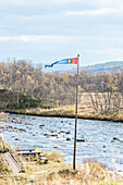  Sweden, Jamtland County, Funäsdalen, Flatruetvägen, Sami flag 