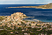 View from the pilgrimage chapel of Notre Dame de la Serra overlooking the bay, town and citadel, Calvi, Balagne, Corsica, France 