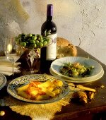 Laid table with pasta dishes