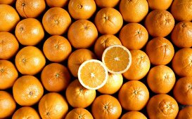 Pile of Oranges; One Cut in Half