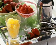 Mango sorbet and strawberry sorbet in glasses