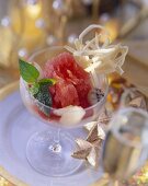 Raspberry sorbet with lychees and pitahaya in glass