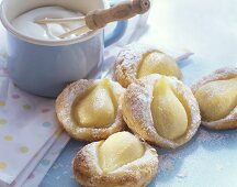 Warm puff pastry pear tartlets with cream