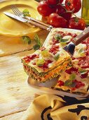 Spinach and mince lasagne with tomatoes and basil