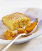 Yoghurt and semolina slice with apricot sauce