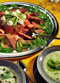 Roast beef platter with kiwi fruits and strawberries