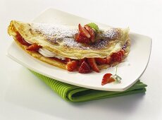 Pancakes with wild strawberries
