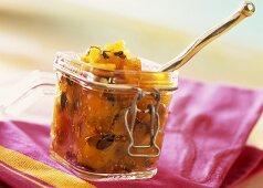 Pumpkin & mango chutney with pumpkin seeds in pickling jar