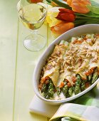 Crespelle filled with green asparagus and baked