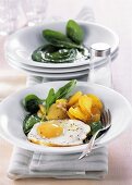 Creamed spinach with fried egg and roast potatoes