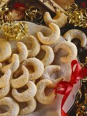 Vanilla crescents on gold-rimmed plate