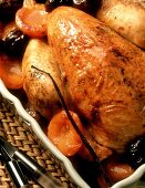Roast chicken with plum and apricot stuffing
