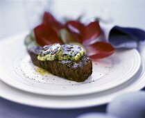 Beef fillet with herb butter and radicchio