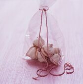 Delicate meringue biscuits in plastic bag