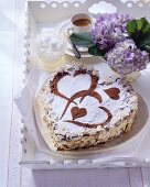 Heart-shaped chocolate gateau with vanilla mascarpone cream