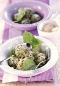 Spinach dumplings with butter sauce and Parmesan