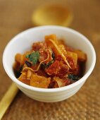 Pumpkin ragout with tomatoes, onions and chorizo