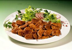 Turkey gyros with salad garnish on plate