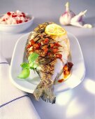 Grilled gilthead bream with tomato and basil salsa