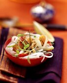 Pumpkin curry with tomatoes and rice noodles