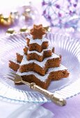 Fir tree shaped chocolate nut cake made from stars