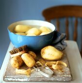 Washing and peeling potatoes