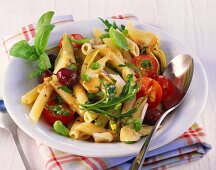 Pasta salad with artichokes and cherry tomatoes