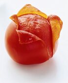 A partly-skinned tomato