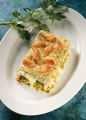 Lasagne of Havel fish & garden vegetables in basil sauce