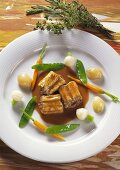 Rhine eel in sauce with pearl onions & young vegetables