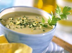Cream of potato soup with gremolata and parsley