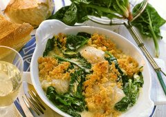 Haddock with spinach crust in a gratin dish