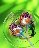 Two stuffed artichokes with sour cream and caviare