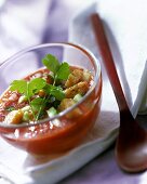 Gazpacho with croutons in a glass bowl