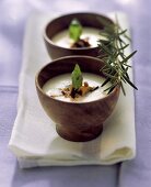 Polenta cream soup with chanterelles and black olives