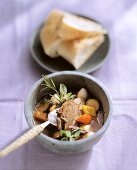 Lamb stew with dried tomatoes, herbs and white bread
