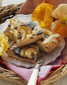 Yeast cake with poppyseeds, quark, apples & icing sugar