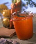 Carrot and lemon preserve in jam jar