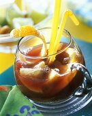 Sangria with orange peel in glass