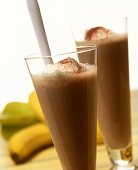 Chocolate shakes with cream; bananas