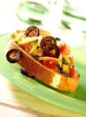 Vegetable crostini (with tomatoes, courgettes & olives)