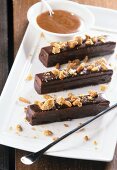 Chocolate mousse bar with chocolate icing & caramel nuts