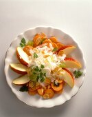 Carrot and radish salad with apple wedges and almonds
