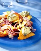 Salad with sweetcorn, avocado dumplings and tortilla chips