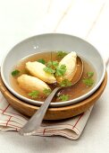 Semolina dumpling soup with parsley